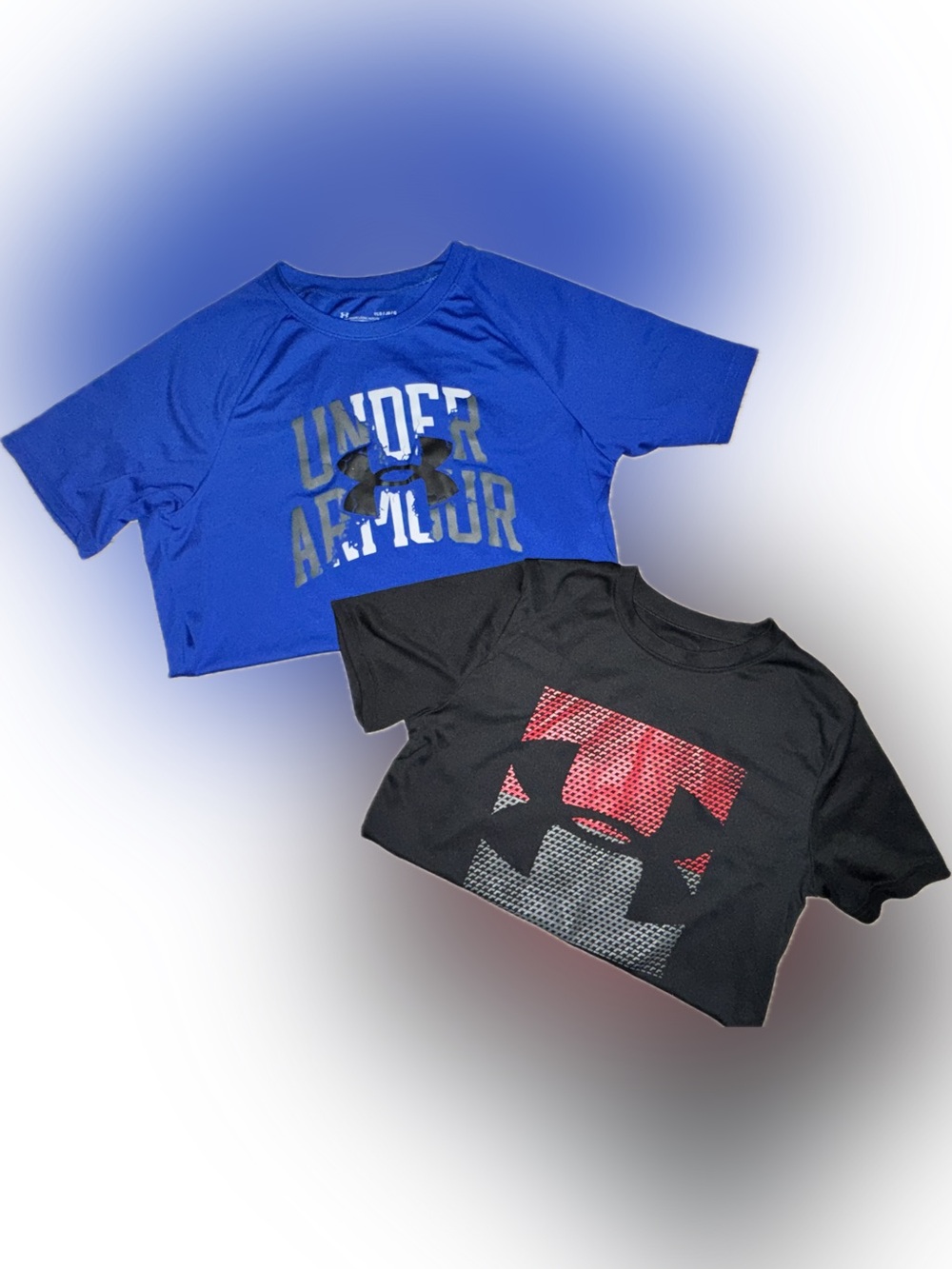 2 short sleeve UA short sleeve tops, size YL